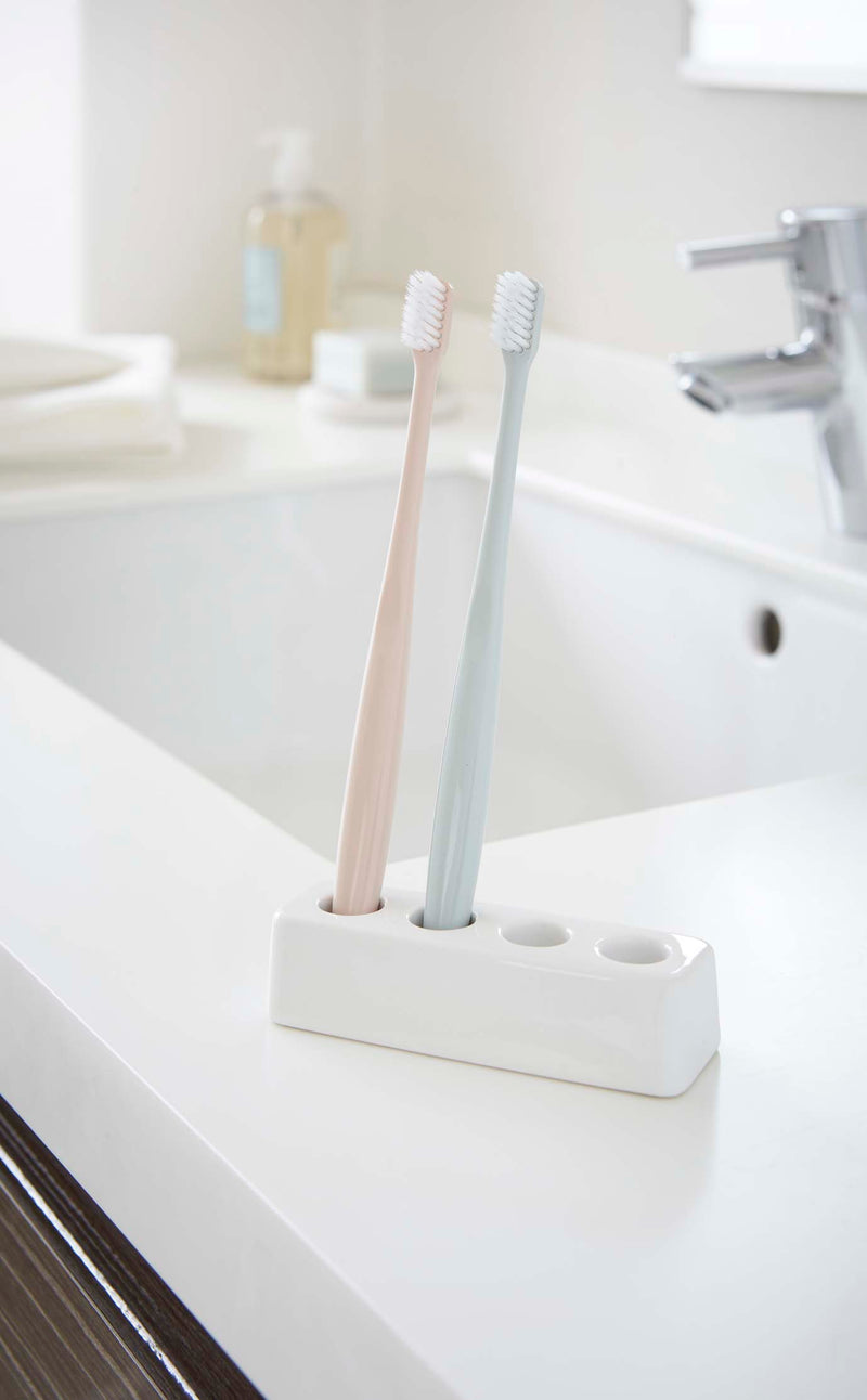 media image for Plain Rectangular Ceramic Toothbrush Stand by Yamazaki 292