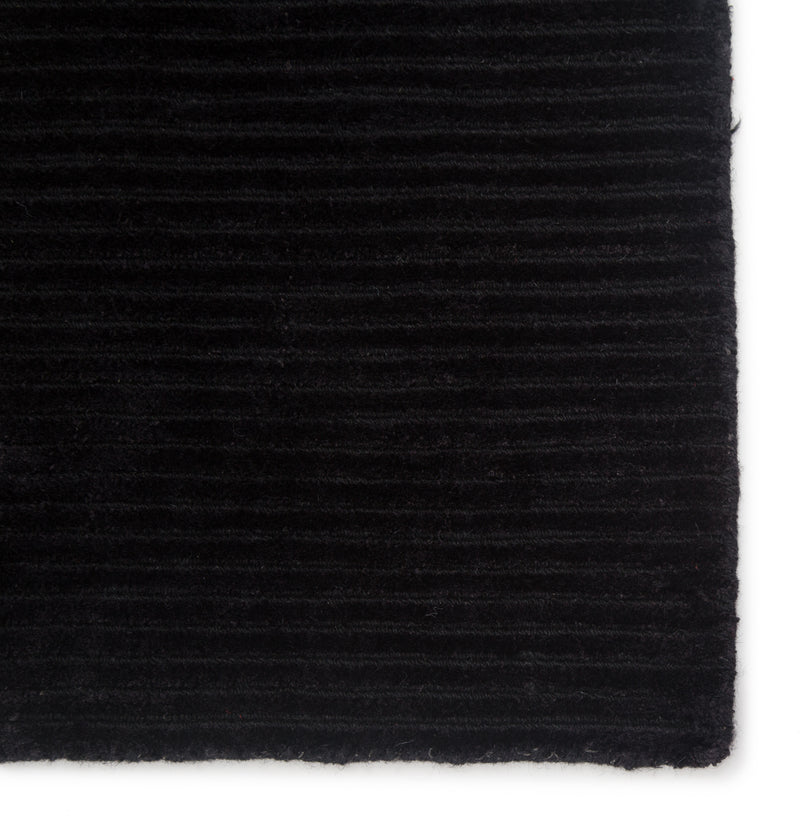 media image for basis solid rug in jet black design by jaipur 4 261