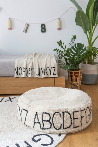 product image for round abc rug in natural black design by lorena canals 12 16