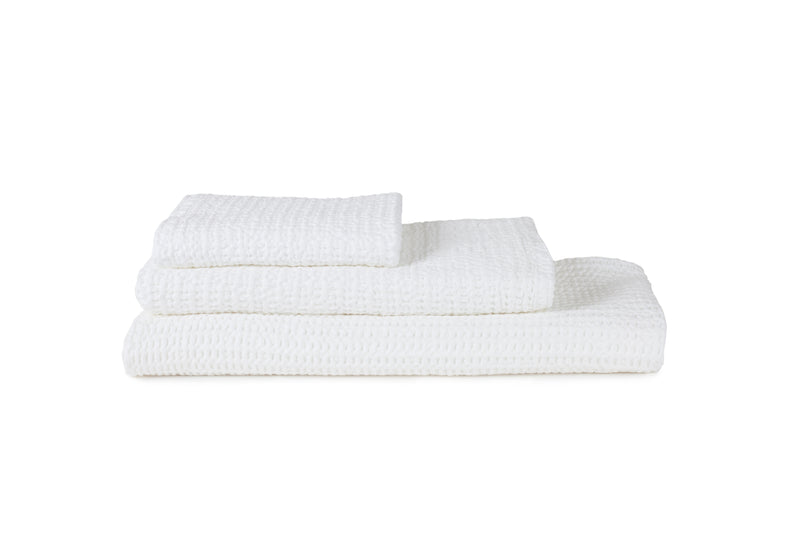 media image for simple waffle towel in various colors design by hawkins new york 1 261