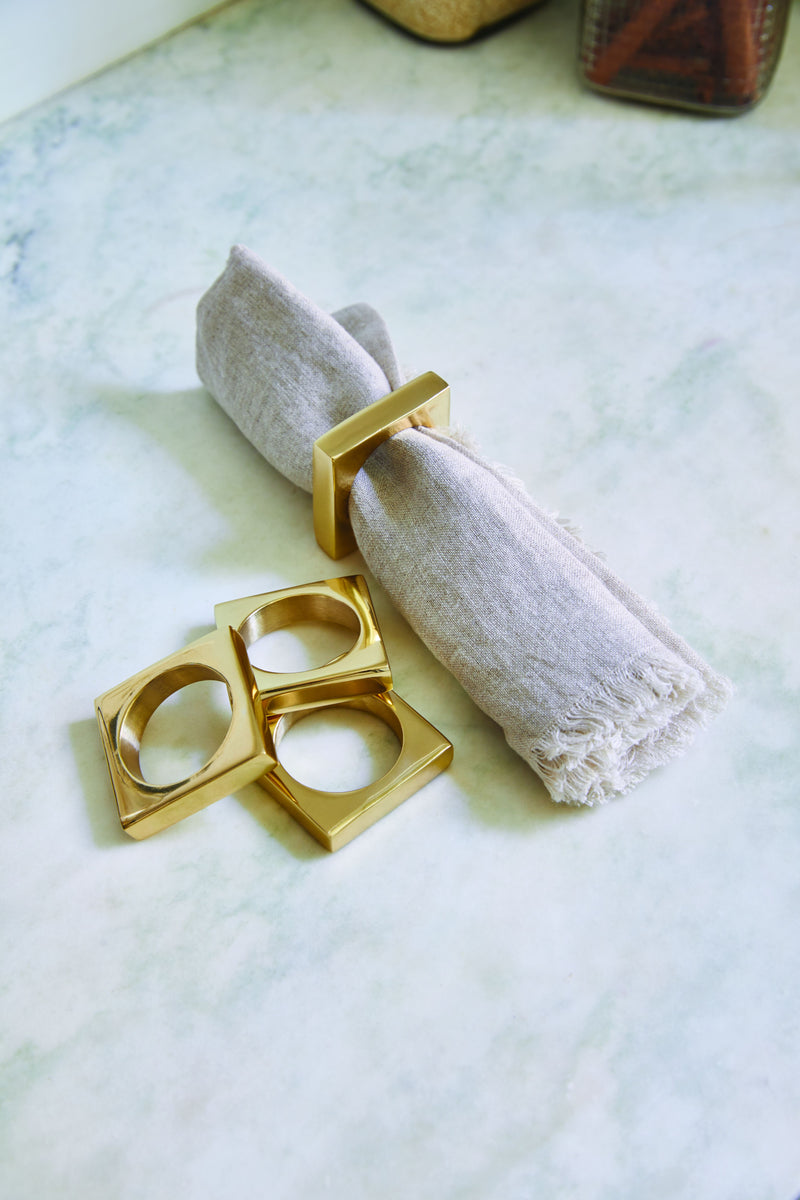 media image for Set of 4 Modernist Napkin Rings in Silver Plated Brass design by Sir/Madam 227