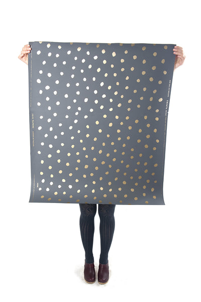 product image for Sisters of the Sun Wallpaper in Gold and Charcoal design by Thatcher Studio 14