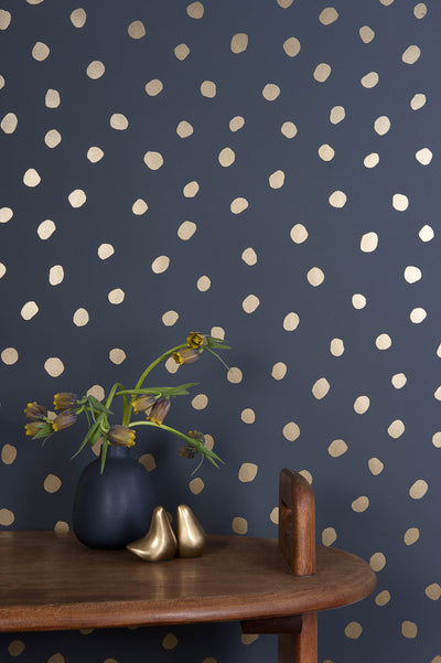 product image for Sisters of the Sun Wallpaper in Gold and Charcoal design by Thatcher Studio 37