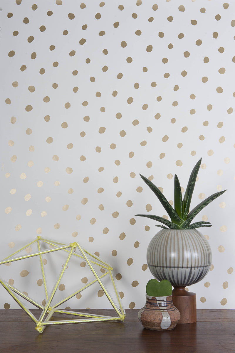 media image for Sisters of the Sun Wallpaper in Gold and Cream design by Thatcher Studio 269
