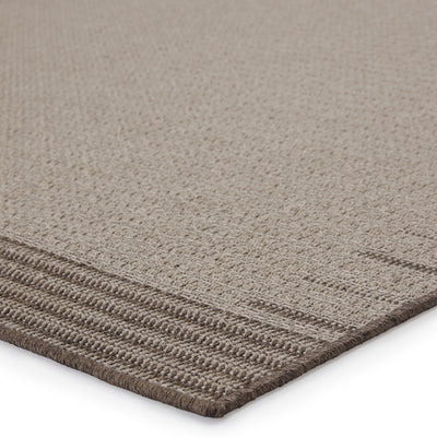 product image for Poerava Indoor/Outdoor Border Grey & Taupe Rug by Jaipur Living 92