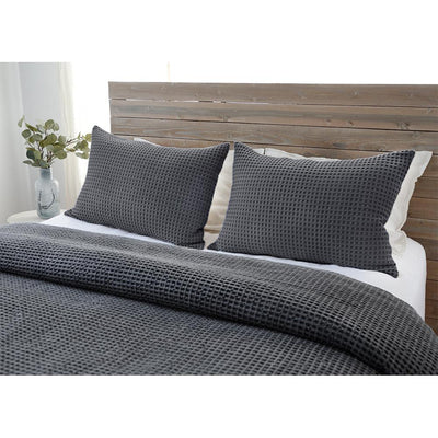 product image of zuma blanket collection in charcoal design by pom pom at home 1 557