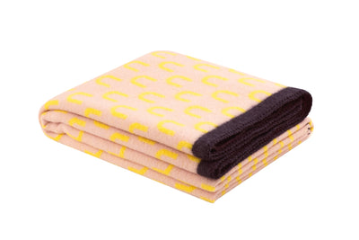 product image of arch throw in yellow and pink 1 55