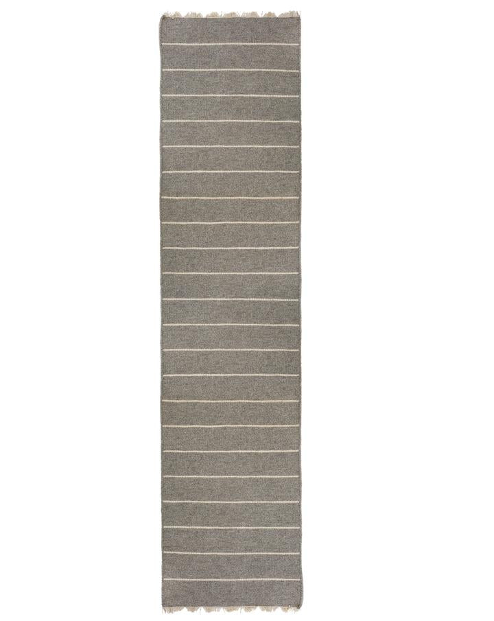 media image for warby handwoven rug in light grey in multiple sizes design by pom pom at home 6 222