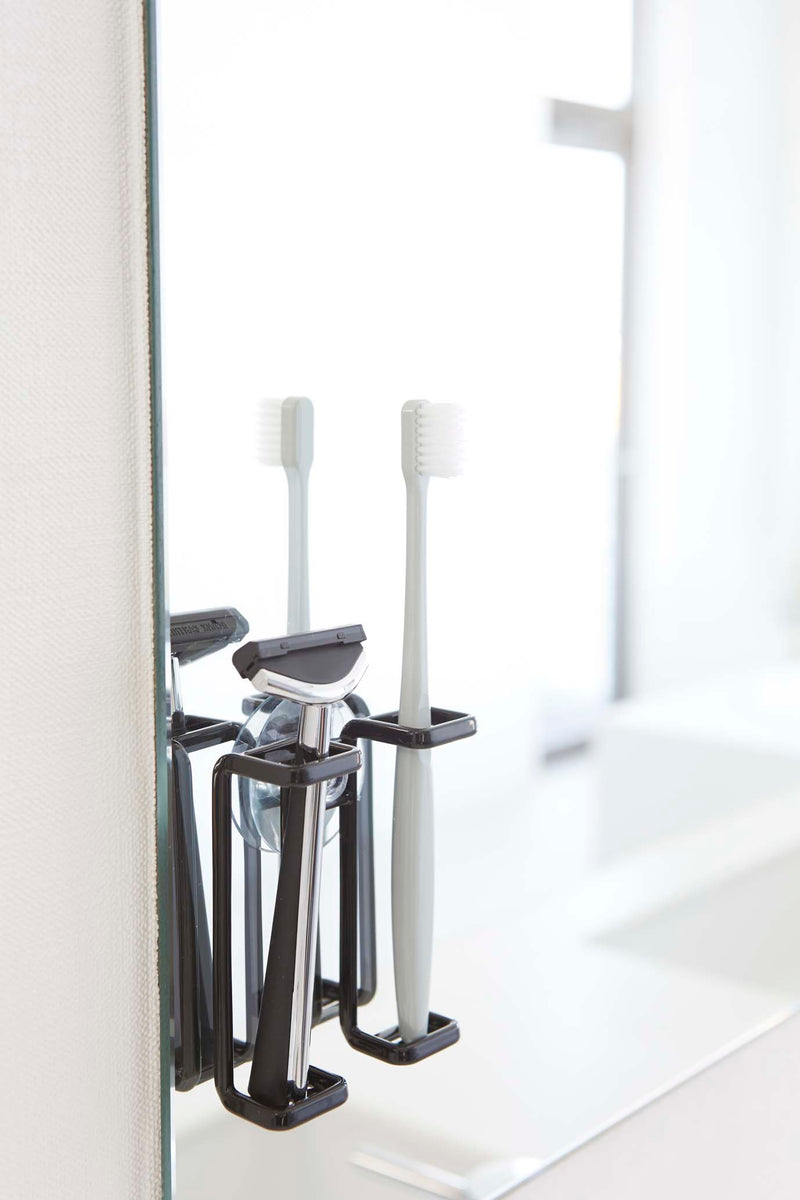 media image for Tower Suction Cup Mounted Toothbrush Holder by Yamazaki 20