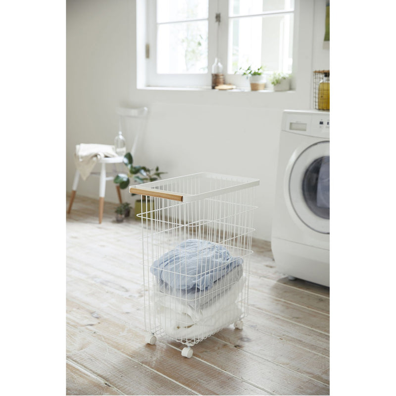 media image for Tosca Slim Rolling Laundry Basket by Yamazaki 275