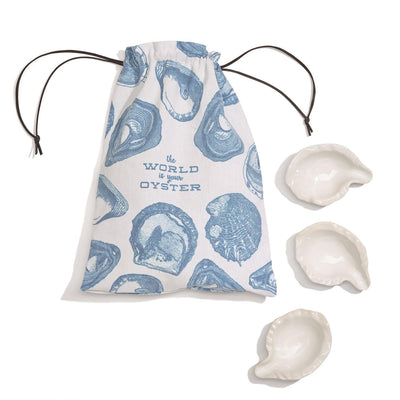 product image of set of 12 the world is your oyster oyster bakers in canvas pouch design by twos company 1 525