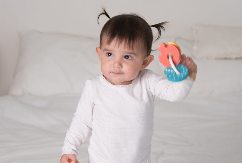 media image for baby rattle by plan toys 2 23