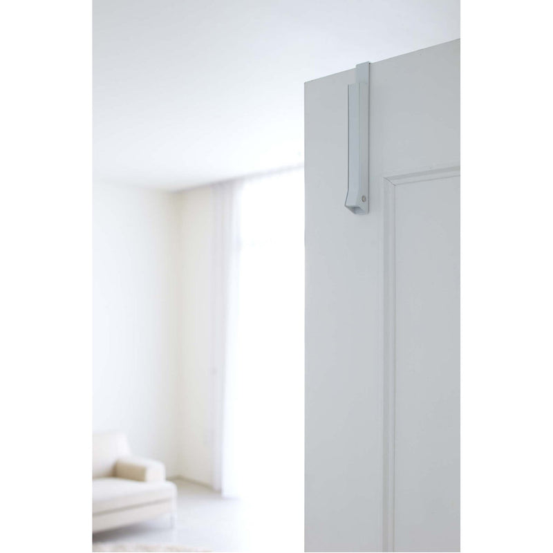 media image for Smart Folding Over the Door Hook by Yamazaki 285