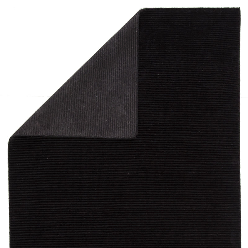 media image for basis solid rug in jet black design by jaipur 3 29