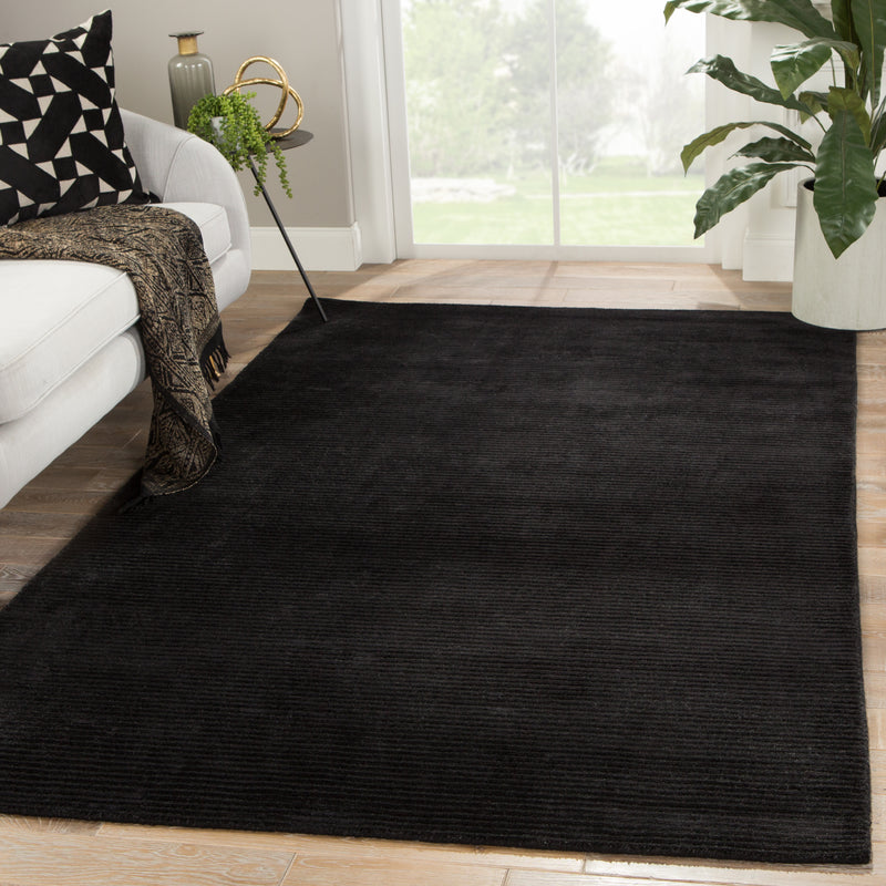media image for basis solid rug in jet black design by jaipur 5 243