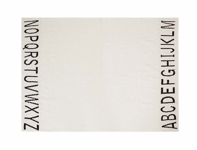 product image of knitted abc baby blanket in natural black design by lorena canals 1 540