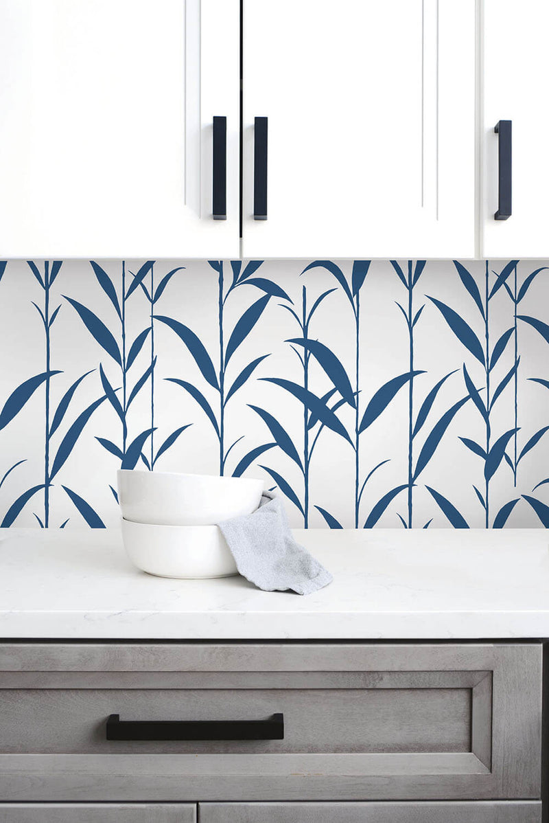 media image for Bamboo Leaves Peel-and-Stick Wallpaper in Navy Blue and White by NextWall 211