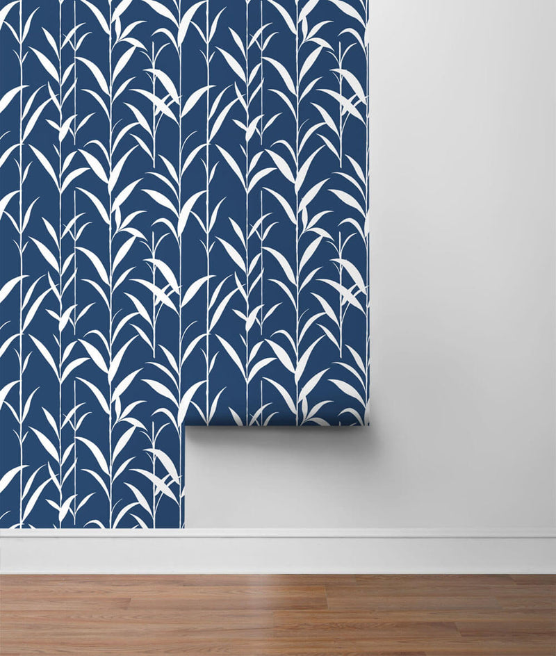 media image for Bamboo Leaves Peel-and-Stick Wallpaper in Navy Blue by NextWall 221
