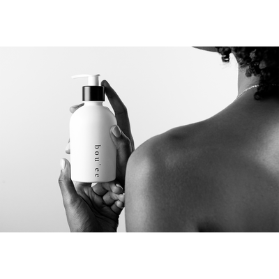 product image of poppy boujee body oil by riddle oil 1 556