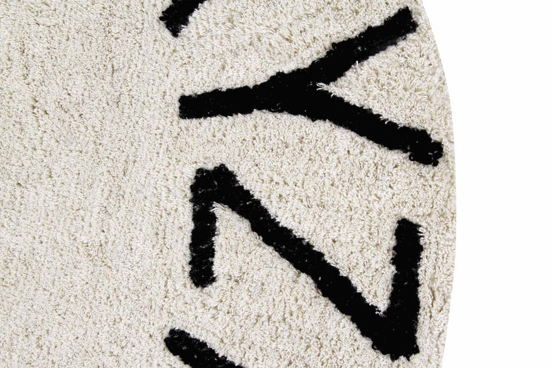media image for round abc rug in natural black design by lorena canals 3 291