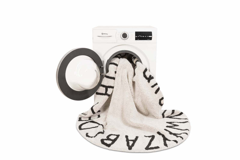 media image for round abc rug in natural black design by lorena canals 6 239