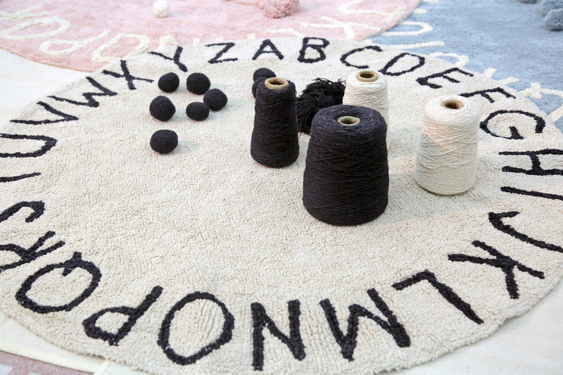 media image for round abc rug in natural black design by lorena canals 8 252