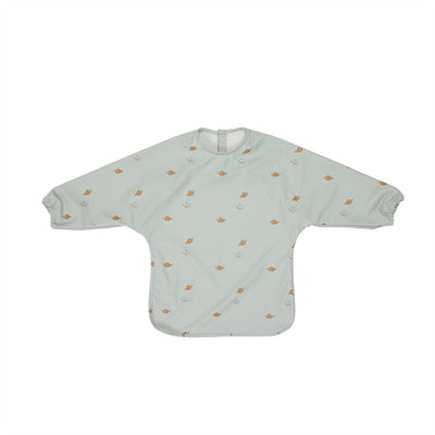 product image of dino cape bib in dusty green 1 515