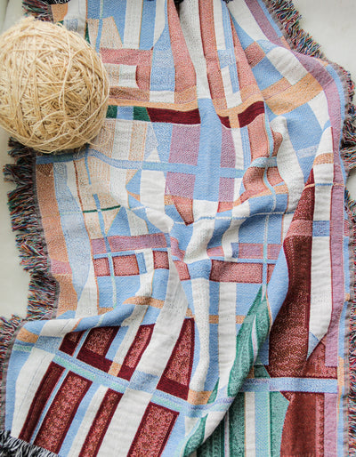 product image of muted woven throw blankets by elise flashman 1 556