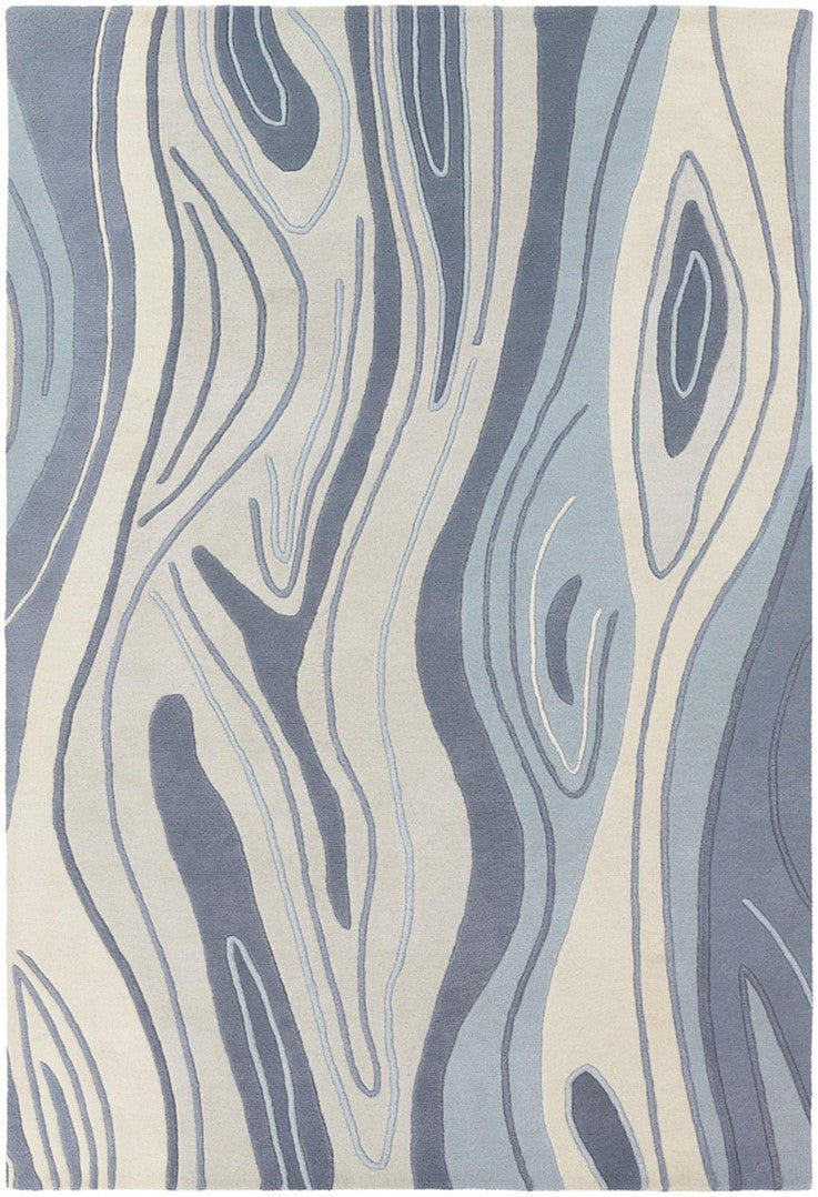 media image for inhabit collection hand tufted area rug blue wood grain design by chandra rugs 1 234