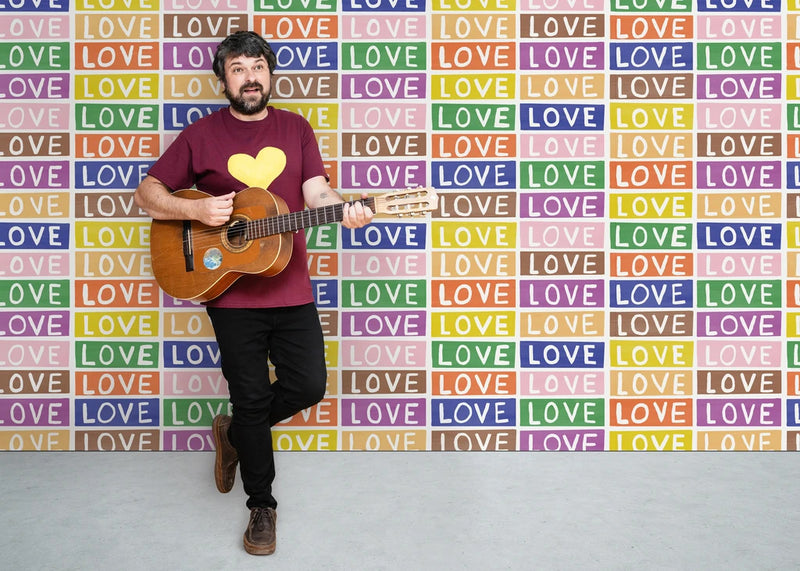 media image for Love Wallpaper in Rainbow on White by Larry Yes for Thatcher Studio 219