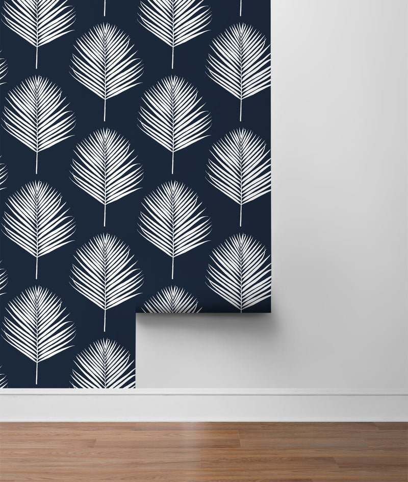 media image for Maui Palm Peel-and-Stick Wallpaper in Midnight Blue and White from the Luxe Haven Collection by Lillian August 271