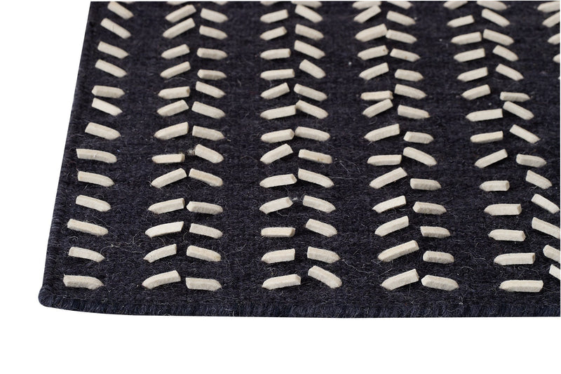 media image for palmdale collection hand woven wool and felt area rug in charcoal and white design by mat the basics 2 214