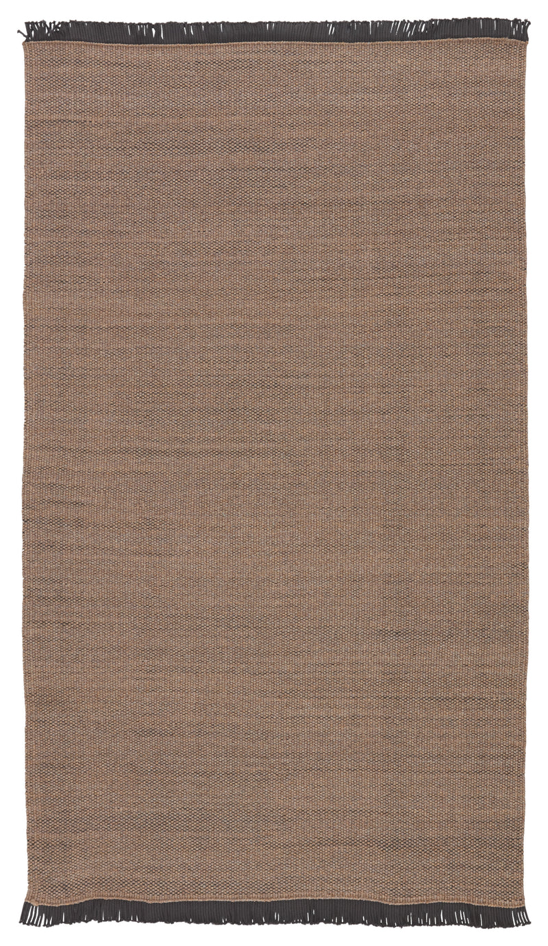 media image for savvy handmade indoor outdoor solid tan black area rug by jaipur living 1 291