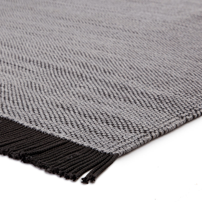 media image for savvy handmade indoor outdoor solid gray black area rug by jaipur living 2 267