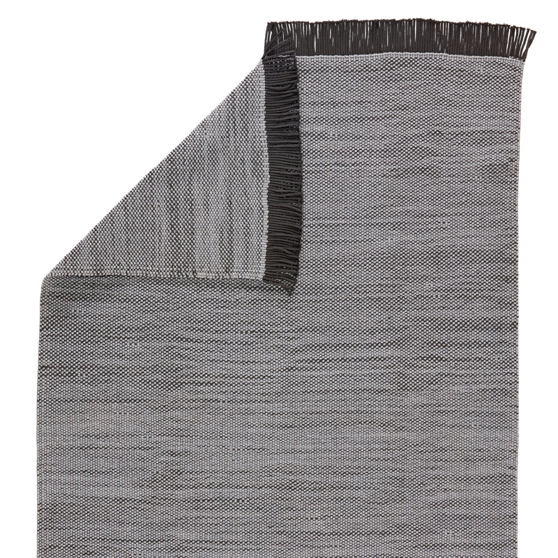 media image for savvy handmade indoor outdoor solid gray black area rug by jaipur living 3 242