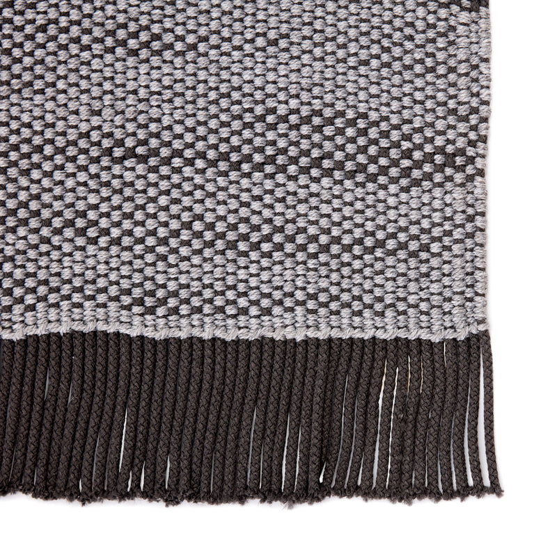 media image for savvy handmade indoor outdoor solid gray black area rug by jaipur living 4 210