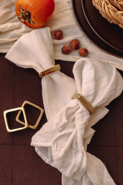 product image for square metal napkin rings on leather tie in brass finish design by bd edition 2 68