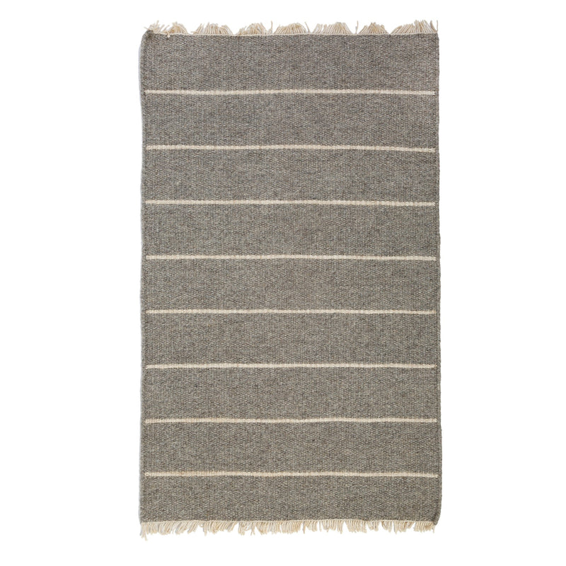 media image for warby handwoven rug in light grey in multiple sizes design by pom pom at home 1 247