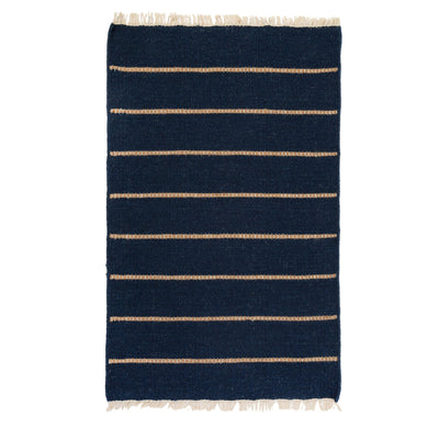product image of warby handwoven rug in navy in multiple sizes design by pom pom at home 1 56