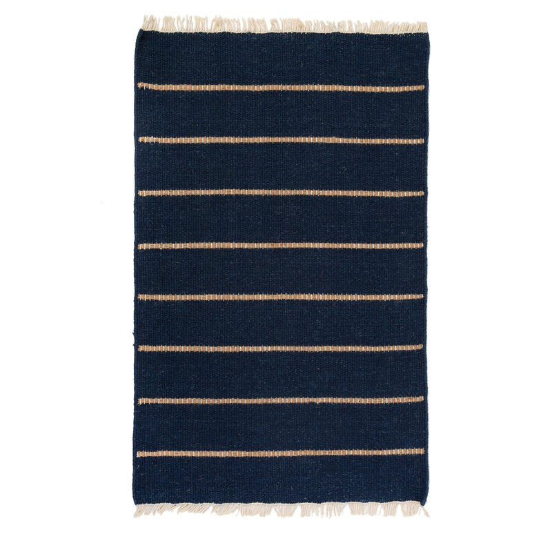 media image for warby handwoven rug in navy in multiple sizes design by pom pom at home 1 269