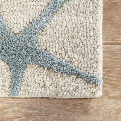 product image for cor24 starfishing handmade animal white blue area rug design by jaipur 3 25