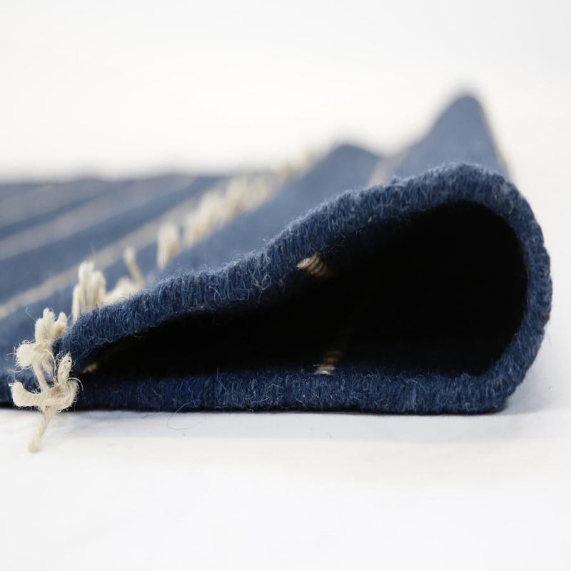media image for warby handwoven rug in navy in multiple sizes design by pom pom at home 6 244