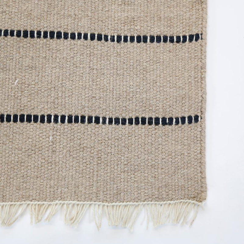 media image for warby handwoven rug in natural in multiple sizes design by pom pom at home 7 28